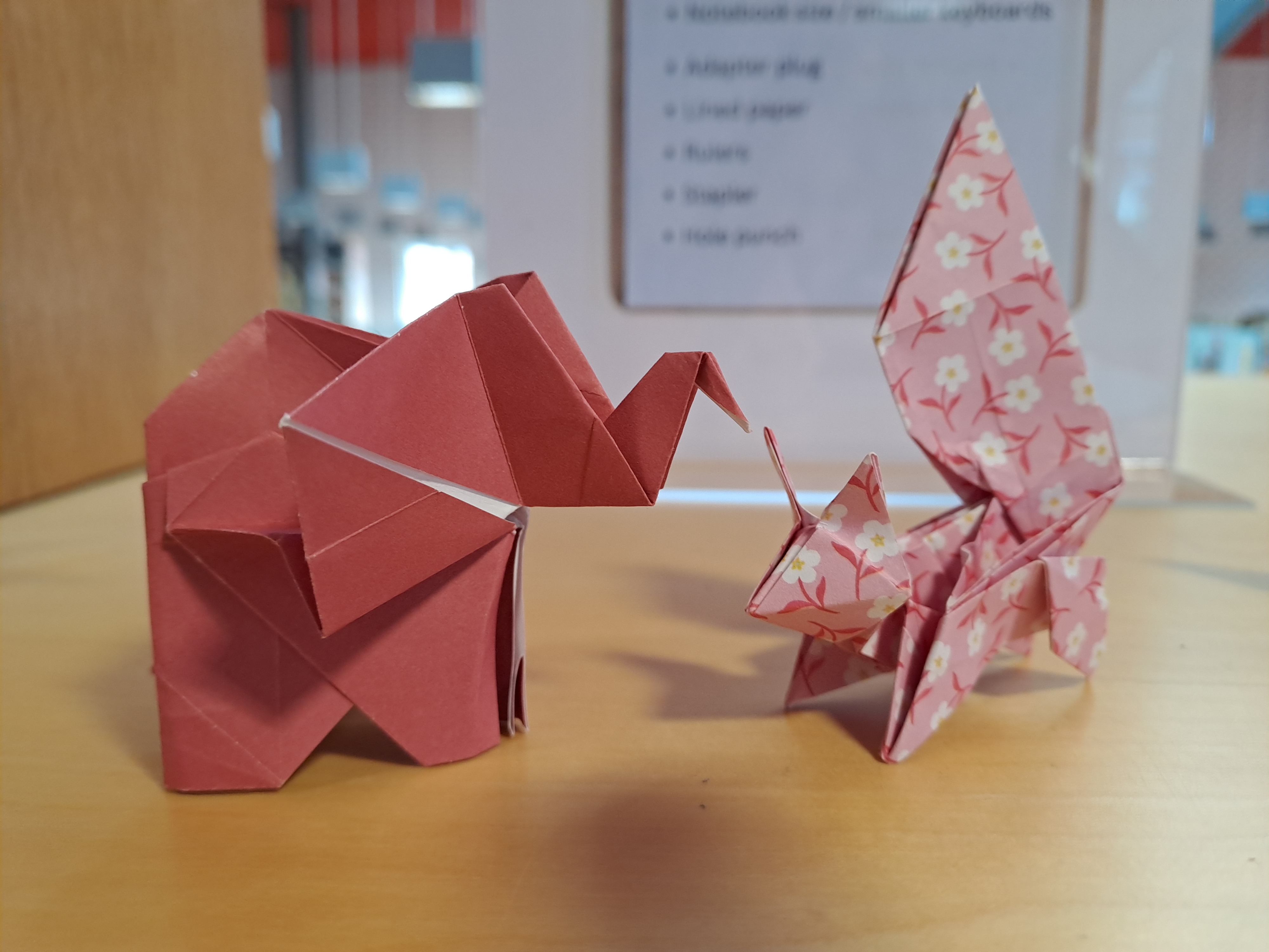 An origami elephant and squirrel